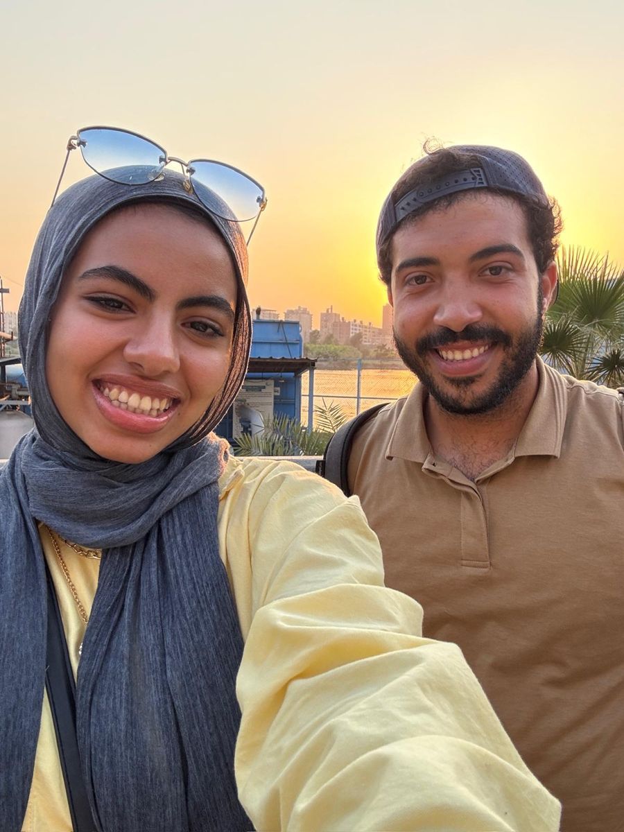 Selfie of us at sunset by the water